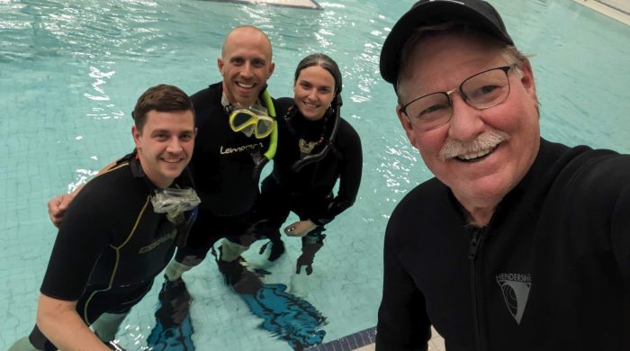 Divers in the pool with Larry